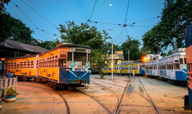 train passing by roads in bengal