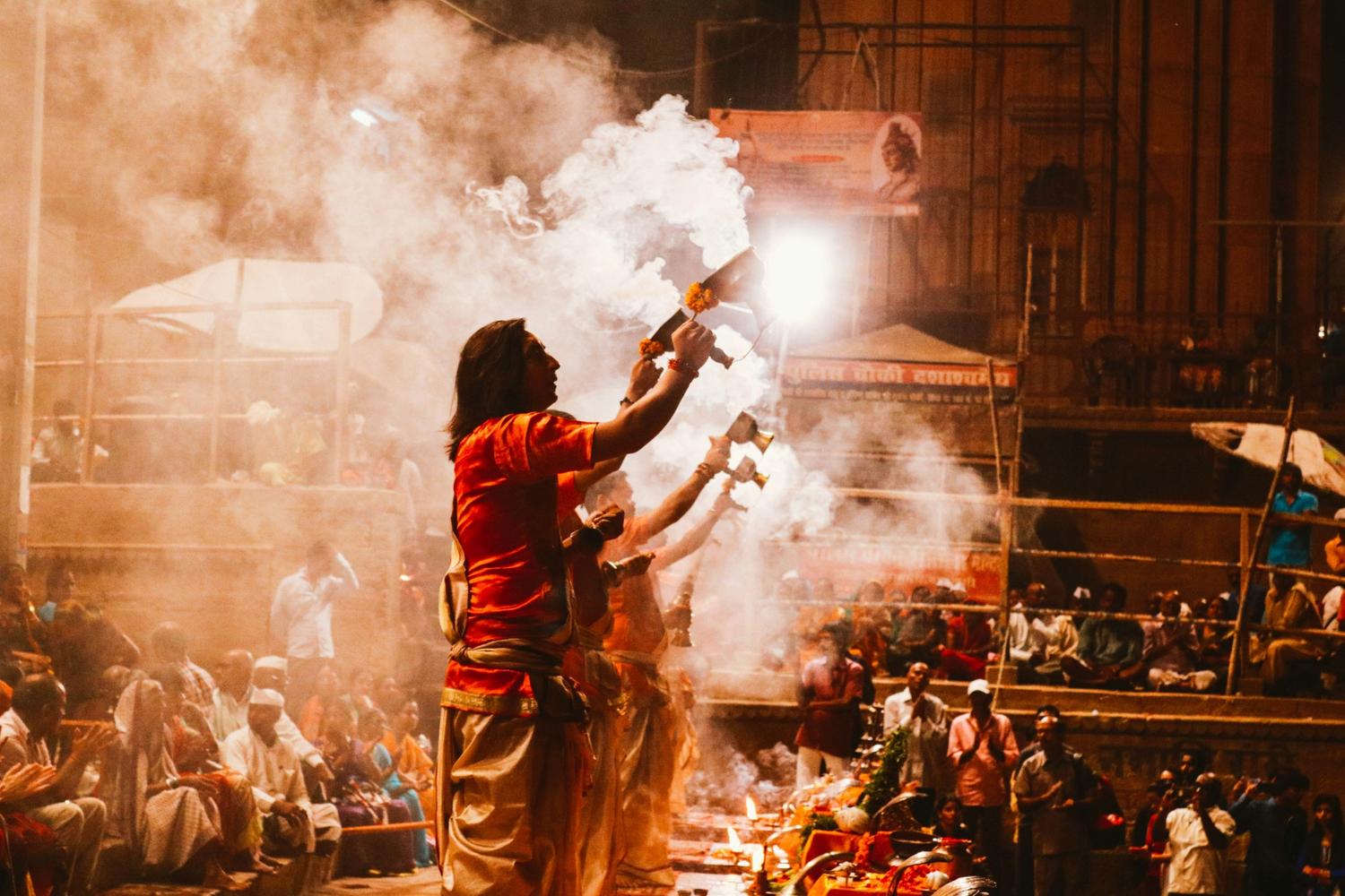rituals performed in india priest doing ganga aarti on ghats of benaras